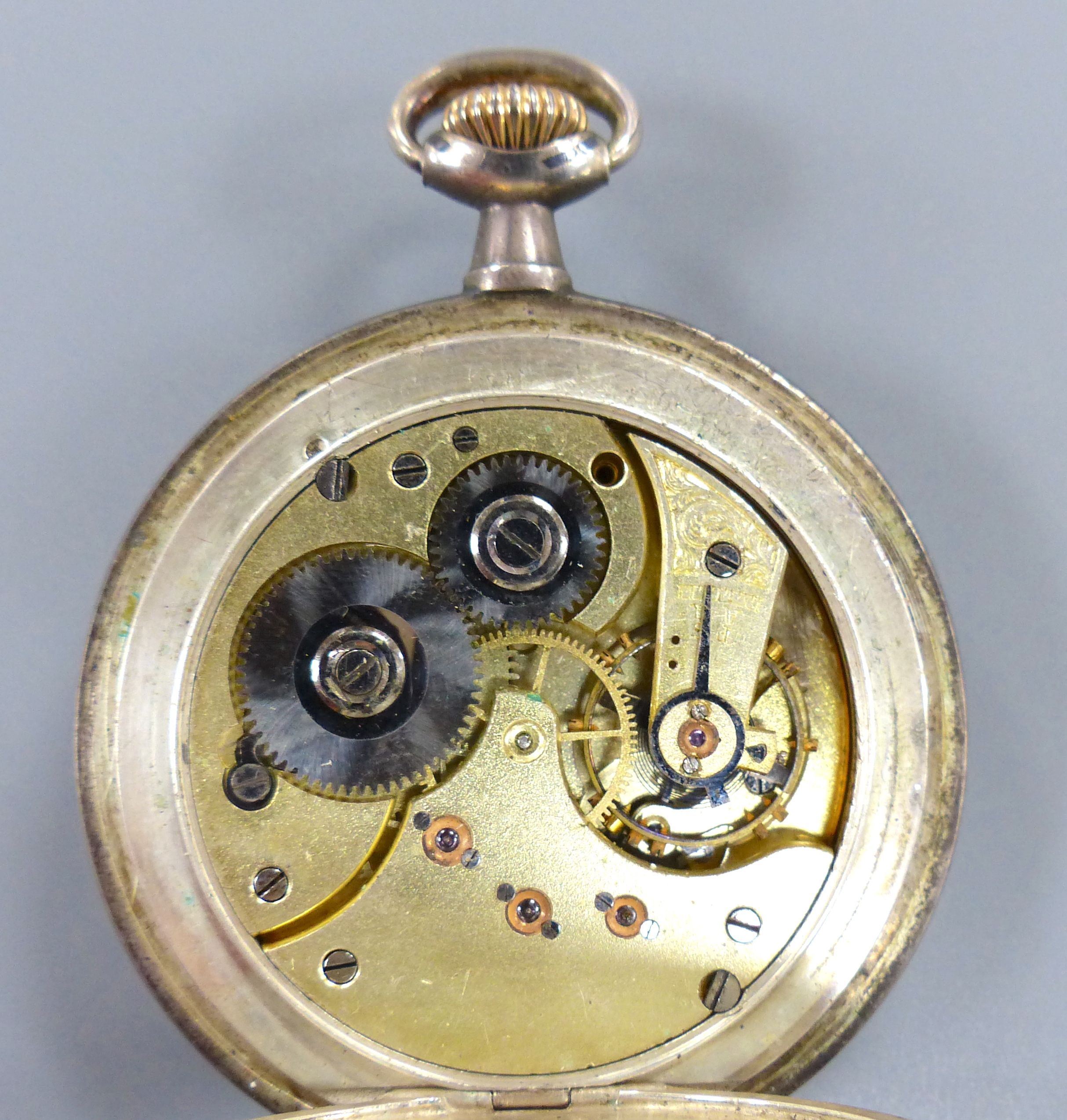 An early 20th century white metal and niello Omega open face keyless pocket watch, dial a.f.,